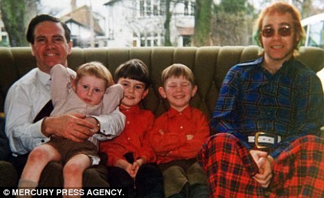 Elton with his father Stanley Dwight and his sons Simon, Robert and Geoff, then seven-years-old